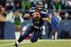 SEATTLE, WA - JANUARY 19: Quarterback Russell Wilson #3 of the Seattle Seahawks drops back against the San Francisco 49ers during the 2014 NFC Championship at CenturyLink Field on January 19, 2014 in Seattle, Washington. (Photo by Ronald Martinez/Getty