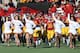 LAS VEGAS, NV - DECEMBER 21: USC Trojans Song Girls run onto the field with the team before their game against the Fresno State Bulldogs in the Royal Purple Las Vegas Bowl at Sam Boyd Stadium on December 21, 2013 in Las Vegas, Nevada. USC won 45-20. (Ph