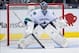 Dec 19, 2013; Dallas, TX, USA; Vancouver Canucks goalie Roberto Luongo (1) defends against the Dallas Stars attack during the game at the American Airlines Center. The Dallas Stars defeated the Vancouver Canucks 4-1. Mandatory Credit: Jerome Miron-USA TO