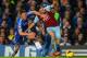 LONDON, ENGLAND - JANUARY 29: Gary Cahill of Chelsea and Stewart Downing of West Ham battle for the ball during the Barclays Premier League match between Chelsea and West Ham United at Stamford Bridge on January 29, 2014 in London, England. (Photo by Mi