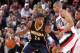 PORTLAND, OR - DECEMBER 2: Paul George #24 of the Indiana Pacers controls the ball against Nicolas Batum #88 of the Portland Trail Blazers on December 2, 2013 at the Moda Center Arena in Portland, Oregon. NOTE TO USER: User expressly acknowledges and agre