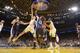 OAKLAND, CA - NOVEMBER 20: Ognjen Kuzmic #1 of the Golden State Warriors shoots a layup against the Memphis Grizzlies on November 20, 2013 at Oracle Arena in Oakland, California. NOTE TO USER: User expressly acknowledges and agrees that, by downloading an
