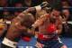 LAS VEGAS, NV - JUNE 09: (R-L) Manny Pacquiao lands a right to the head of Timothy Bradley during their WBO welterweight title fight at MGM Grand Garden Arena on June 9, 2012 in Las Vegas, Nevada. (Photo by Jeff Bottari/Getty Images)