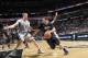 SAN ANTONIO, TX - January 12: J.J. Barea #11 of the Minnesota Timberwolves handles the ball against Matt Bonner #15 of the San Antonio Spurs at the AT&T Center on January 12, 2014 in San Antonio, Texas. NOTE TO USER: User expressly acknowledges and agree