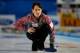 RIGA, LATVIA - MARCH 21: Ekaterina Galkina of Russia gives team mates instructions after she throws a stone in the match between Russia and USA on Day 6 of the Titlis Glacier Mountain World Women's Curling Championship at the Volvo Sports Centre on March