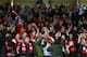 MANCHESTER, ENGLAND - OCTOBER 23: General View of the dedicated singing section for home fans during the UEFA Champions League Group A match between Manchester United and Real Sociedad at Old Trafford on October 23, 2013 in Manchester, England. (Photo b