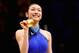VANCOUVER, BC - FEBRUARY 25: Kim Yu-Na of South Korea celebrates winning the gold medal in the Ladies Free Skating during the medal ceremony on day 14 of the 2010 Vancouver Winter Olympics at Pacific Coliseum on February 25, 2010 in Vancouver, Canada. (