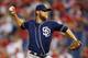 PHILADELPHIA, PA -SEPTEMBER 10: Pitcher Andrew Cashner #34 of the San Diego Padres delivers a pitch against the Philadelphia Phillies in a MLB baseball game on September 10, 2013 at Citizens Bank Park in Philadelphia, Pennsylvania. (Photo by Rich Schultz