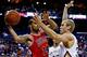 Feb 1, 2014; New Orleans, LA, USA; Chicago Bulls point guard D.J. Augustin (14) passes as New Orleans Pelicans center Greg Stiemsma (34) defends during the first quarter of a game at the New Orleans Arena. Mandatory Credit: Derick E. Hingle-USA TODAY Spor