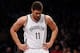 NEW YORK, NY - DECEMBER 12: Brook Lopez #11 of the Brooklyn Nets looks on during the first half against the Los Angeles Clippers at Barclays Center on December 12, 2013 in the Brooklyn borough of New York City. NOTE TO USER: User expressly acknowledges a
