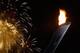 SOCHI, RUSSIA - FEBRUARY 07: The Olympic flame burns bright as fireworks explode over the Olympic Park during the Opening Ceremony of the Sochi 2014 Winter Olympics at Fisht Olympic Stadium on February 7, 2014 in Sochi, Russia. (Photo by Scott Halleran/