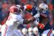 Nov 30, 2013; Auburn, AL, USA; Alabama Crimson Tide offensive linesman Arie Kouandjio (77) battles Auburn Tigers defensive lineman Gabe Wright (90) n the first quarter at Jordan Hare Stadium. Mandatory Credit: RVR Photos-USA TODAY Sports