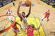 OAKLAND, CA - JANUARY 30: Harrison Barnes #40 of the Golden State Warriors dunks against the Los Angeles Clippers on January 30, 2014 at Oracle Arena in Oakland, California. NOTE TO USER: User expressly acknowledges and agrees that, by downloading and or