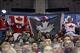 Dec 30, 2013; Toronto, Ontario, Canada; Canada fans wave Canadian flags against USA during the first period in an exhibition hockey game at Air Canada Centre. USA beat Canada 3-2. Mandatory Credit: Tom Szczerbowski-USA TODAY Sports