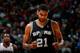 ATLANTA, GA - JANUARY 24: Tim Duncan #21 of the San Antonio Spurs reacts after a basket against the Atlanta Hawks at Philips Arena on January 24, 2014 in Atlanta, Georgia. NOTE TO USER: User expressly acknowledges and agrees that, by downloading and or