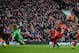 LIVERPOOL, ENGLAND - FEBRUARY 08: Raheem Sterling of Liverpool scores the third goal during the Barclays Premier League match between Liverpool and Arsenal at Anfield on February 8, 2014 in Liverpool, England. (Photo by Michael Regan/Getty Images)