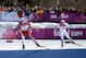 SOCHI, RUSSIA - FEBRUARY 08: Marit Bjoergen of Norway approaches the finish line ahead of Charlotte Kalla of Sweden to win gold in the Ladies' Skiathlon 7.5 km Classic + 7.5 km Free during day one of the Sochi 2014 Winter Olympics at Laura Cross-country