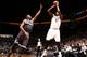 NEW YORK, NY - JANUARY 21: Andray Blatche #0 of the Brooklyn Nets shoots against Maurice Harkless #21 of the Orlando Magic during a game at the Barclays Center on January 21, 2014 in the Brooklyn borough of New York City. NOTE TO USER: User expressly ack