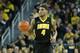 ANN ARBOR, MI - JANUARY 22: Roy Devyn Marble #4 of the Iowa Hawkeyes brings the ball up the court during the second half of the game against the Michigan Wolverines at Crisler Arena on January 22, 2014 in Ann Arbor, Michigan. The Wolverines defeated the H