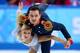 SOCHI, RUSSIA - FEBRUARY 06: Tatiana Volosozhar and Maxim Trankov of Russia compete in the Figure Skating Pairs Short Program during the Sochi 2014 Winter Olympics at Iceberg Skating Palace on February 6, 2014 in Sochi, Russia. (Photo by Clive Mason/Get