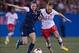Jan 31, 2014; Frisco, TX, USA; USA midfielder Heather OReilly (9) battles for the ball with Canada midfielder Brittany Baxter (17) during the second half at Toyota Stadium. The USA won 1-0. Mandatory Credit: Jerome Miron-USA TODAY Sports