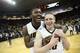 IOWA CITY, IA - FEBRUARY 08: Center Gabriel Olaseni #0 celebrates with guard Mike Gesell #10 of the Iowa Hawkeyes after defeating the Michigan Wolverines on February 8, 2014 at Carver-Hawkeye Arena, in Iowa City, Iowa. Iowa won 85-67. (Photo by Matthew H