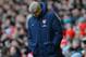 LIVERPOOL, ENGLAND - FEBRUARY 08: Arsenal Manager Arsene Wenger looks dejected during the Barclays Premier League match between Liverpool and Arsenal at Anfield on February 8, 2014 in Liverpool, England. (Photo by Michael Regan/Getty Images)