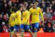 LIVERPOOL, ENGLAND - FEBRUARY 08: Jack Wilshere of Arsenal looks dejected during the Barclays Premier League match between Liverpool and Arsenal at Anfield on February 8, 2014 in Liverpool, England. (Photo by Michael Regan/Getty Images)