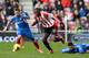 SUNDERLAND, ENGLAND - FEBRUARY 08: Jozy Altidore of Sunderland gets past Liam Rosenior and Curtis Davies of Hull City during the Premier League match between Sunderland and Hull City at Stadium of Light on February 8, 2014 in Sunderland, England. (Photo