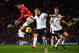 MANCHESTER, ENGLAND - FEBRUARY 09: Robin van Persie of Manchester United competes with John Heitinga of Fulham during the Barclays Premier League match between Manchester United and Fulham at Old Trafford on February 9, 2014 in Manchester, England. (Ph