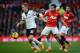 MANCHESTER, ENGLAND - FEBRUARY 09: Rafael of Manchester United competes with Lewis Holtby (L) and Kieran Richardson of Fulham during the Barclays Premier League match between Manchester United and Fulham at Old Trafford on February 9, 2014 in Manchester,