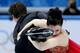 SOCHI, RUSSIA - FEBRUARY 09: Tessa Virtue and Scott Moir of Canada competes in the Team Ladies Free Skating during day two of the Sochi 2014 Winter Olympics at Iceberg Skating Palace onon February 9, 2014 in Sochi, Russia. (Photo by Matthew Stockman/Get