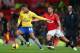MANCHESTER, ENGLAND - NOVEMBER 10: Ryan Giggs of Manchester United competes with Serge Gnabry of Arsenal during the Barclays Premier League match between Manchester United and Arsenal at Old Trafford on November 10, 2013 in Manchester, England. (Photo b