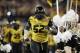 Jan 3, 2014; Arlington, TX, USA; Missouri Tigers defensive lineman Michael Sam (52) runs on the field before the game against the Oklahoma State Cowboys at the 2014 Cotton Bowl at AT&T Stadium. Missouri beat Oklahoma State 41-31. Mandatory Credit: Tim Hei