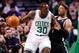 Jan 26, 2014; Boston, MA, USA; Brooklyn Nets small forward Paul Pierce (right) defends Boston Celtics power forward Brandon Bass (30) during the first half at TD Garden. Mandatory Credit: Mark L. Baer-USA TODAY Sports