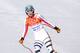 SOCHI, RUSSIA - FEBRUARY 10: Maria Hoefl-Riesch of Germany in action during the Alpine Skiing Women's Super Combined Downhill on day 3 of the Sochi 2014 Winter Olympics at Rosa Khutor Alpine Center on February 10, 2014 in Sochi, Russia. (Photo by Alexand