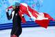 SOCHI, RUSSIA - FEBRUARY 10: Gold medalist Charles Hamelin of Canada celebrates after wiining the Short Track Men's 1500m Final on day 3 of the Sochi 2014 Winter Olympics at Iceberg Skating Palace on February 10, 2014 in Sochi, Russia. (Photo by Matthew