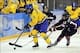 Feb 9, 2014; Sochi, RUSSIA; Sweden forward Jenni Asserholt (4) battles for the puck with Japan forward Moeko Fujimoto (13) in a women's ice hockey preliminary round game during the Sochi 2014 Olympic Winter Games at Shayba Arena. Mandatory Credit: Scott R