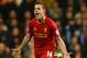 LONDON, ENGLAND - DECEMBER 15: Jordan Henderson of Liverpool celebrates scoring their second goal during the Barclays Premier League match between Tottenham Hotspur and Liverpool at White Hart Lane on December 15, 2013 in London, England. (Photo by Paul