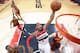 WASHINGTON, DC - FEBRUARY 7: John Wall #2 of the Washington Wizards dunks against Dion Waiters #3 and Tyler Zeller #40 of the Cleveland Cavaliers during the game at the Verizon Center on February 7, 2014 in Washington, DC. NOTE TO USER: User expressly ack