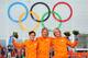 SOCHI, RUSSIA - FEBRUARY 10: (L-R) Silver medalist Jan Smeekens of the Netherlands, gold medallist Michel Mulder of the Netherlands and bronze medalist Ronald Mulder of the Netherlands celebrate on the podium during the flower ceremony for the Men's 500m