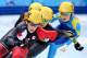 SOCHI, RUSSIA - FEBRUARY 10: Marianne St-Gelais of Canada, Ayuko Ito of Japan and Inna Simonova of Kazakhstan compete in the Short Track Speed Skating Ladies' 500m heats on day 3 of the Sochi 2014 Winter Olympics at Iceberg Skating Palace on February 10,