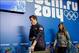 Feb 5, 2014; Krasnaya Polyana, RUSSIA; Shaun White (left) and Kaitlyn Farrington (right) walk off following the USA Snowboarding Halfpipe Press Conference at Gorki Media Center. Mandatory Credit: Andrew P. Scott-USA TODAY Sports