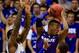LAWRENCE, KS - JANUARY 11: Marcus Foster #2 of the Kansas State Wildcats controls the ball as Wayne Selden, Jr. #1 and Frank Mason #0 of the Kansas Jayhawks defend during the game at Allen Fieldhouse on January 11, 2014 in Lawrence, Kansas. (Photo by Ja