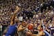 Feb 10, 2014; Manhattan, KS, USA; Kansas State Wildcats guard/forward Wesley Iwundu (25) drives to the basket against Kansas Jayhawks guard Wayne Selden, Jr. (1) and forward Perry Ellis (34) during first-half action at Fred Bramlage Coliseum. Mandatory Cr
