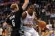 Feb 5, 2014; Oklahoma City, OK, USA; Oklahoma City Thunder small forward Kevin Durant (35) dribbles the ball around Minnesota Timberwolves small forward Robbie Hummel (6) during the fourth quarter at Chesapeake Energy Arena. Mandatory Credit: Mark D. Smit