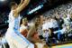 CHAPEL HILL, NC - DECEMBER 18: Isaiah Taylor #1 of the Texas Longhorns calls a time out as he is pressured by J.P. Tokoto #13 and Nate Britt #0 of the North Carolina Tar Heels during the final seconds of their game at the Dean Smith Center on December 18