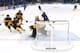 SOCHI, RUSSIA - FEBRUARY 11: Jennifer Harss #30 of Germany makes a save in front of Susanne Fellner #18, Susann Goetz #12, Sophie Kratzer #3 of Germany and Lina Wester #13 of Sweden during the Women's Ice Hockey Preliminary Round Group B game on day four