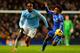 MANCHESTER, ENGLAND - FEBRUARY 03: Willian of Chelsea marshalls Yaya Toure of Manchester City during the Barclays Premier League match between Manchester City and Chelsea at Etihad Stadium on February 3, 2014 in Manchester, England. (Photo by Shaun Bott