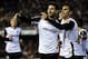 VALENCIA, SPAIN - DECEMBER 01: Jonas (R) of Valencia celebrates after scoring with his teammate Antonio Barragan during the La Liga match between Valencia CF and CA Osasuna at Estadio Mestalla on December 01, 2013 in Valencia, Spain. (Photo by Manuel Q